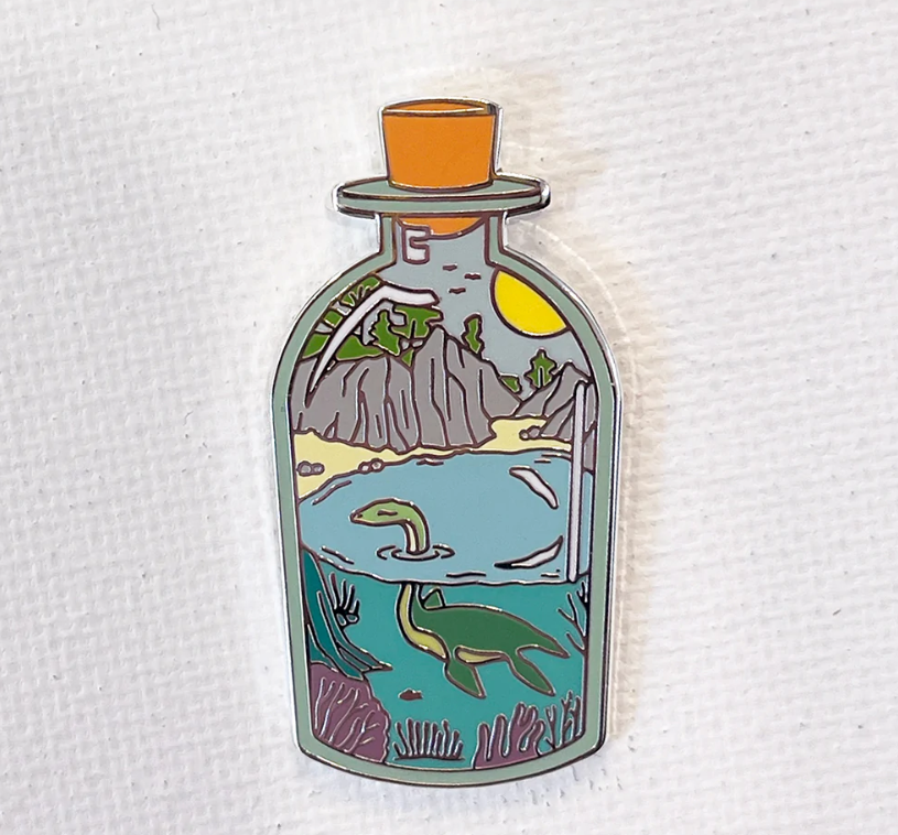 Dinosaur Bottle Strike Gently Enamel Pins Milk Shop Ottawa, Canada