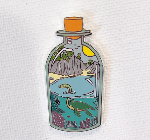 Dinosaur Bottle Enamel Pin